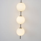 Modern Minimalist Vertical Glass Globe Wall Sconce for Bedroom Hallway and Bathroom Lighting