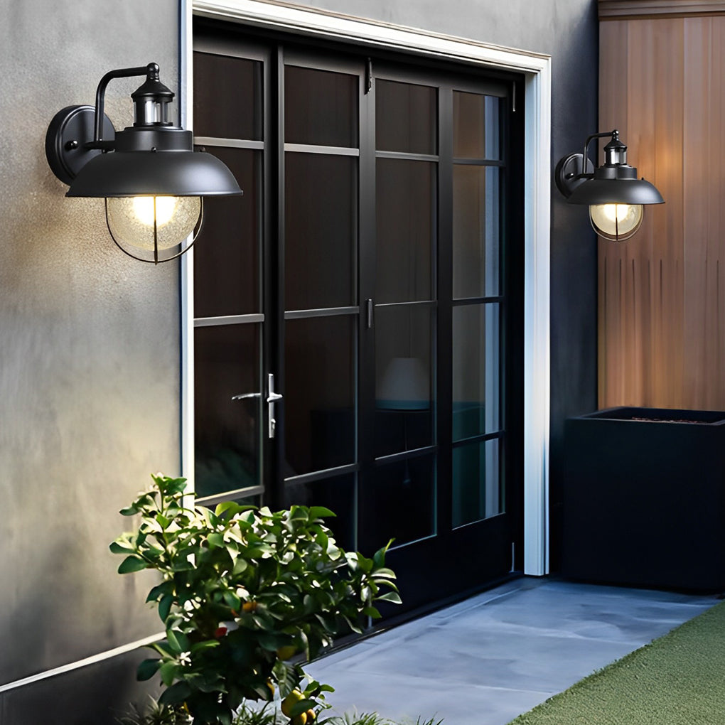 Modern Nautical Black Outdoor Wall Sconce with Seeded Glass and Metal Cage for Porch
