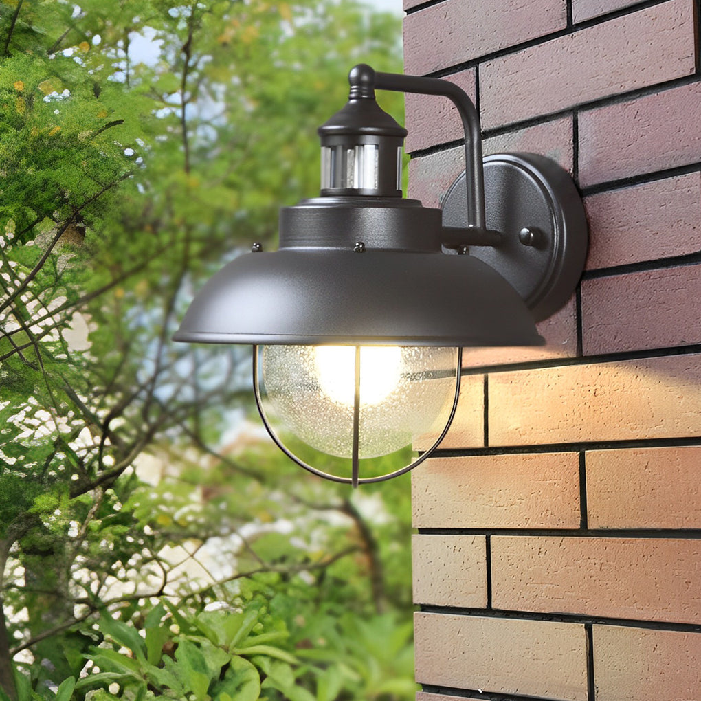 Modern Nautical Black Outdoor Wall Sconce with Seeded Glass and Metal Cage for Porch