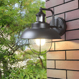 Modern Nautical Black Outdoor Wall Sconce with Seeded Glass and Metal Cage for Porch