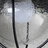 Modern Nautical Black Outdoor Wall Sconce with Seeded Glass and Metal Cage for Porch