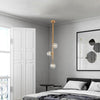 Modern Nordic Elongated Gold Pendant Light with Glass Shades for Dining and Living Areas