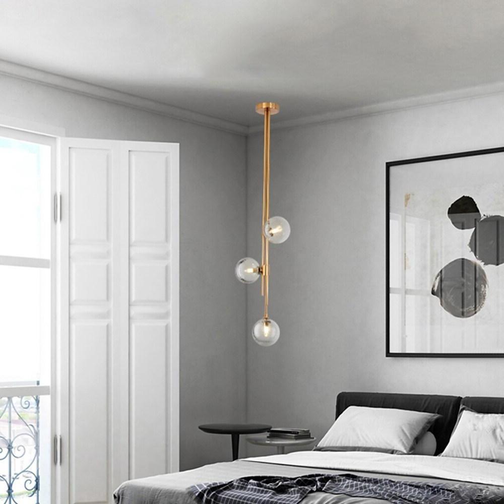 Modern Nordic Elongated Gold Pendant Light with Glass Shades for Dining and Living Areas