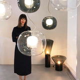 modern-pearl-sphere-pendant-lamp-with-matte-inner-core-and-clear-glass-shade