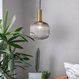 Modern Ribbed Glass Pendant Light with Metal Fixture in Amber Green and Gray Finishes