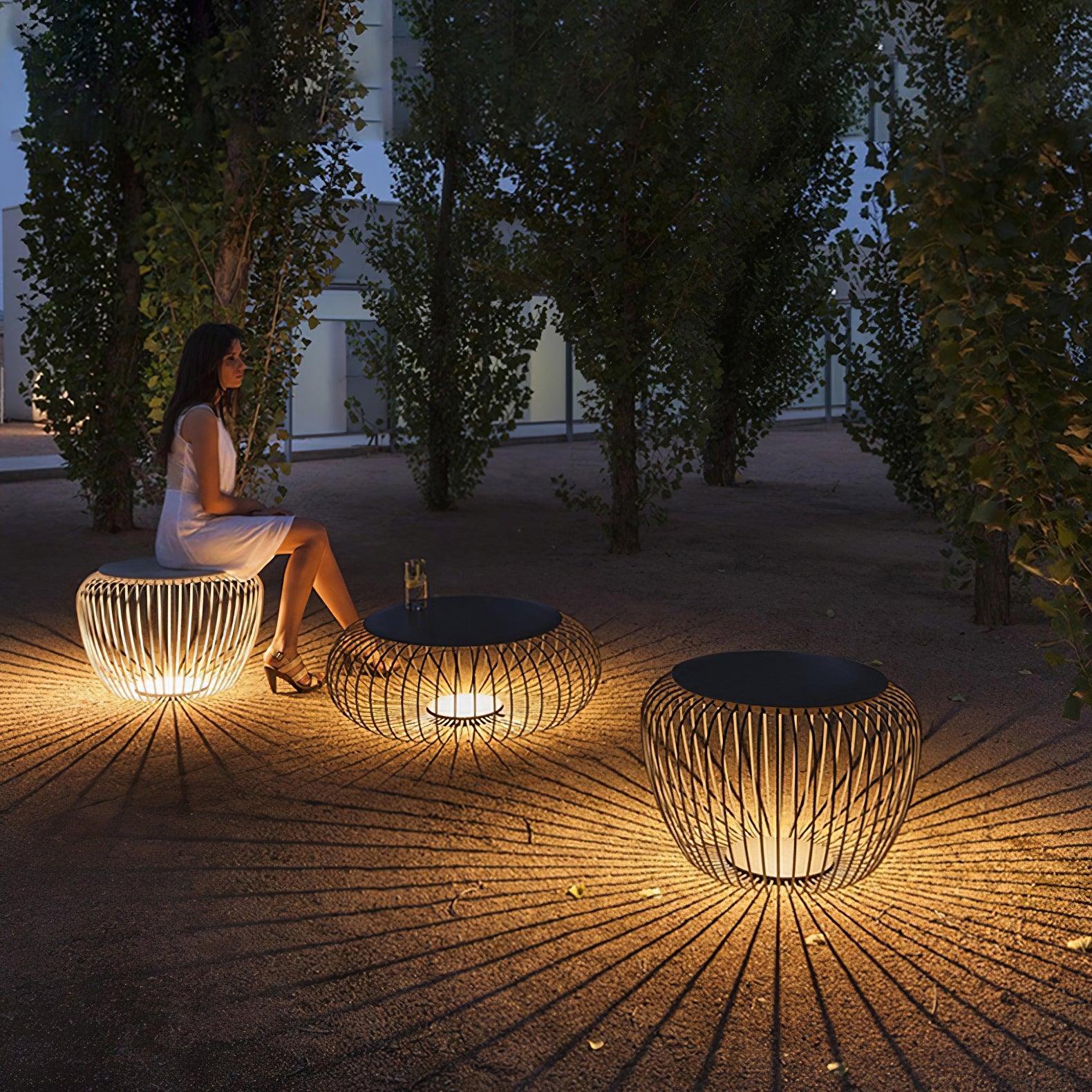 modern-round-steel-outdoor-garden-table-light-with-integrated-solar-powered-led-lighting