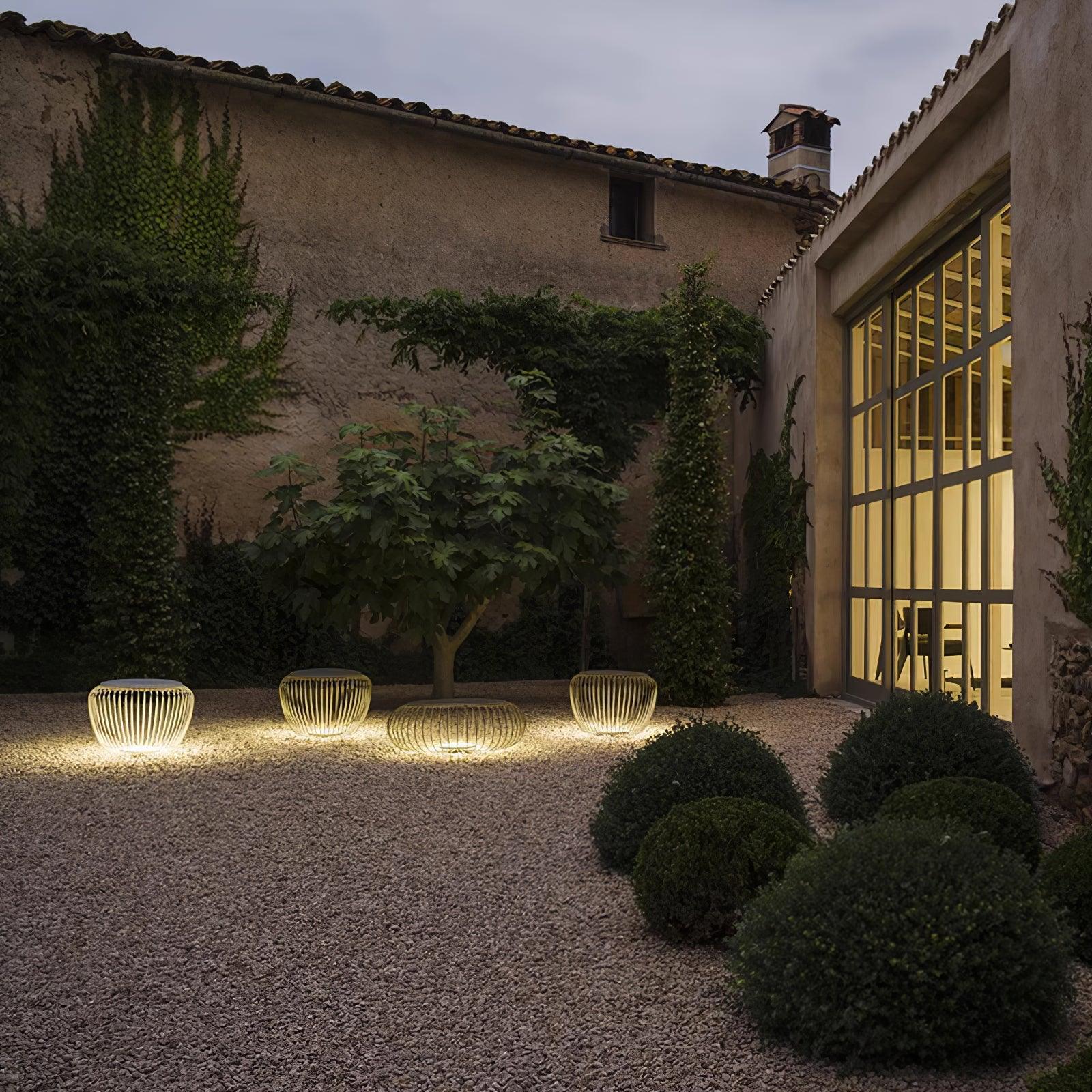 modern-round-steel-outdoor-garden-table-light-with-integrated-solar-powered-led-lighting