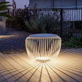 modern-round-steel-outdoor-garden-table-light-with-integrated-solar-powered-led-lighting