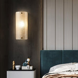 Modern Rounded Opaque Glass Wall Sconce with Antique Brass Finish Interior Lighting