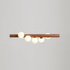 Modern Scandinavian Wood Linear Pendant Light with Glass Globe Shades
