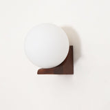 Modern Spherical Glass Globe Wall Sconce with Natural Solid Wood Base and G9 LED Socket