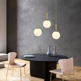 Modern Spherical Glass Pendant Light Brass and Black Contemporary Ceiling Hanging Fixture