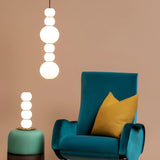 Modern Stacked Double Globe Glass Pendant Light with Gold Finish and Integrated LED
