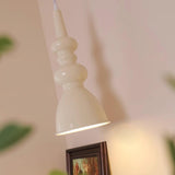 Modern Svelte Undulating Metal Pendant Light for Contemporary Dining and Foyer