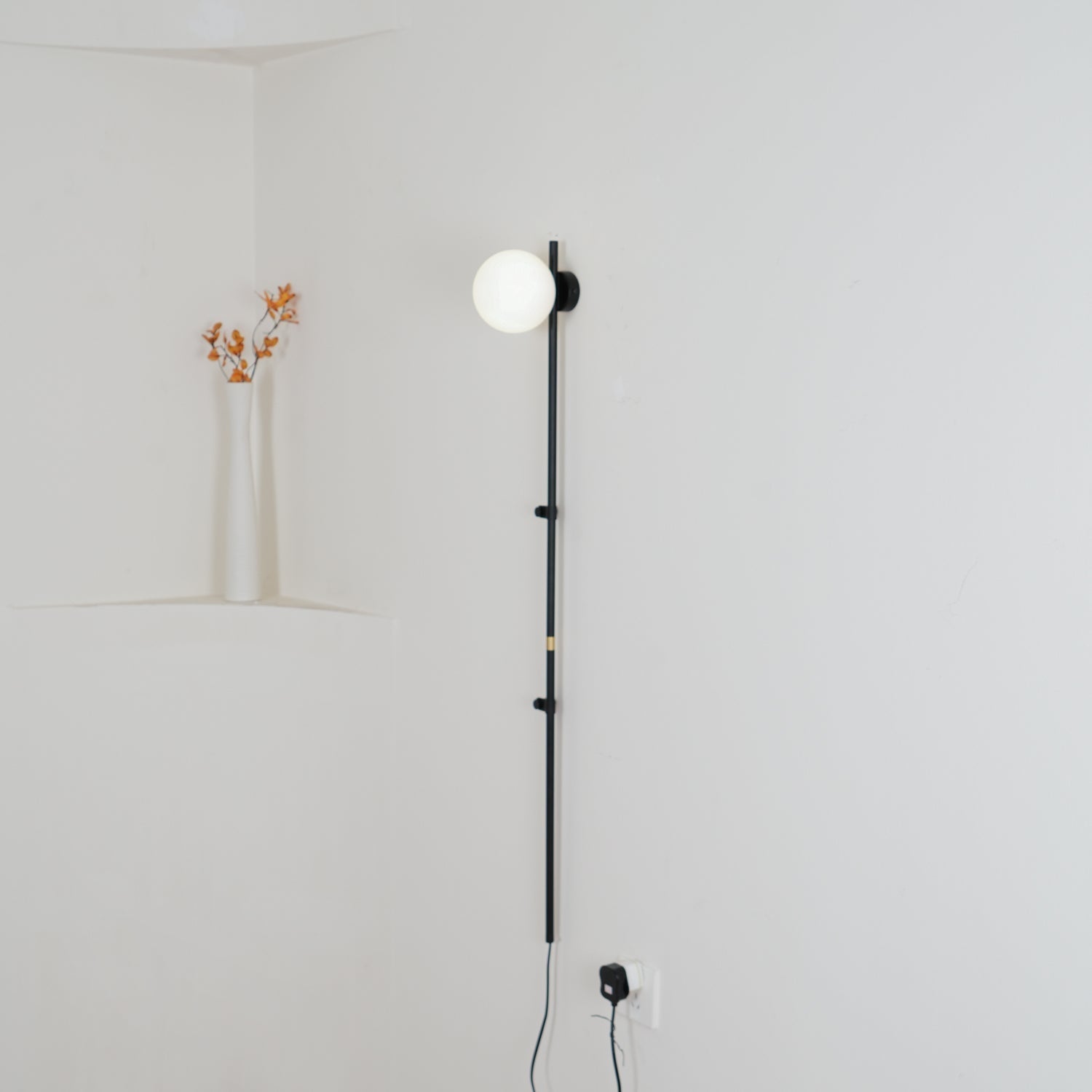 Modern Tall Vertical Stem Wall Lamp with White Glass Globe and Plug In Cord