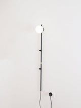 Modern Tall Vertical Stem Wall Lamp with White Glass Globe and Plug In Cord
