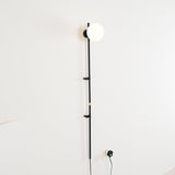 Modern Tall Vertical Stem Wall Lamp with White Glass Globe and Plug In Cord