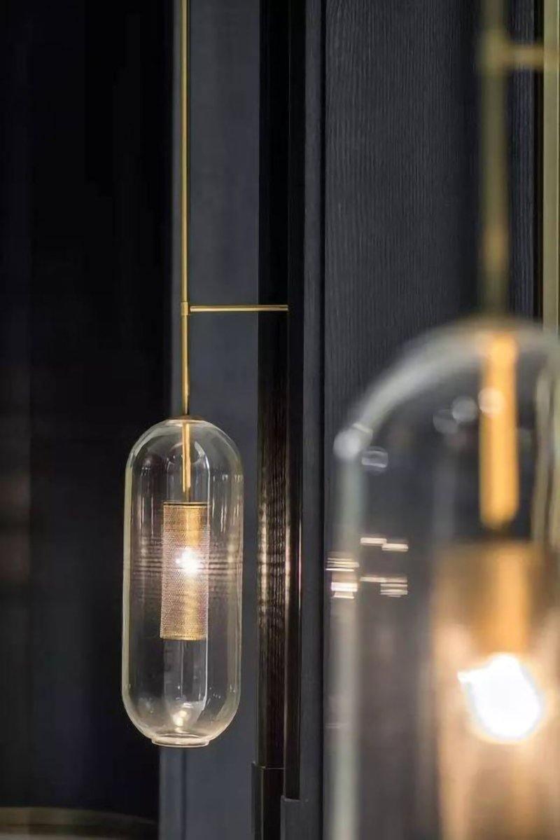 modern-vadim-industrial-wall-lamp-with-glass-shade-and-steel-rod-structure
