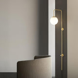 Modern Vertical Brass Wall Sconce with Globe Glass Shade Plug In Lighting Fixture