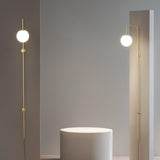 Modern Vertical Brass Wall Sconce with Globe Glass Shade Plug In Lighting Fixture