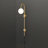 Modern Vertical Brass Wall Sconce with Globe Glass Shade Plug In Lighting Fixture