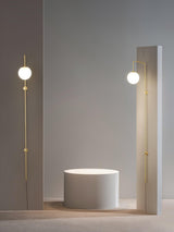 Modern Vertical Brass Wall Sconce with Globe Glass Shade Plug In Lighting Fixture
