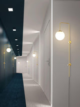 Modern Vertical Brass Wall Sconce with Globe Glass Shade Plug In Lighting Fixture