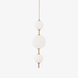Modern Vertical Glass Globe Pendant Light in Black and Brass Finishes