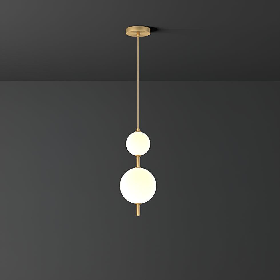 Modern Vertical Glass Globe Pendant Light in Black and Brass Finishes