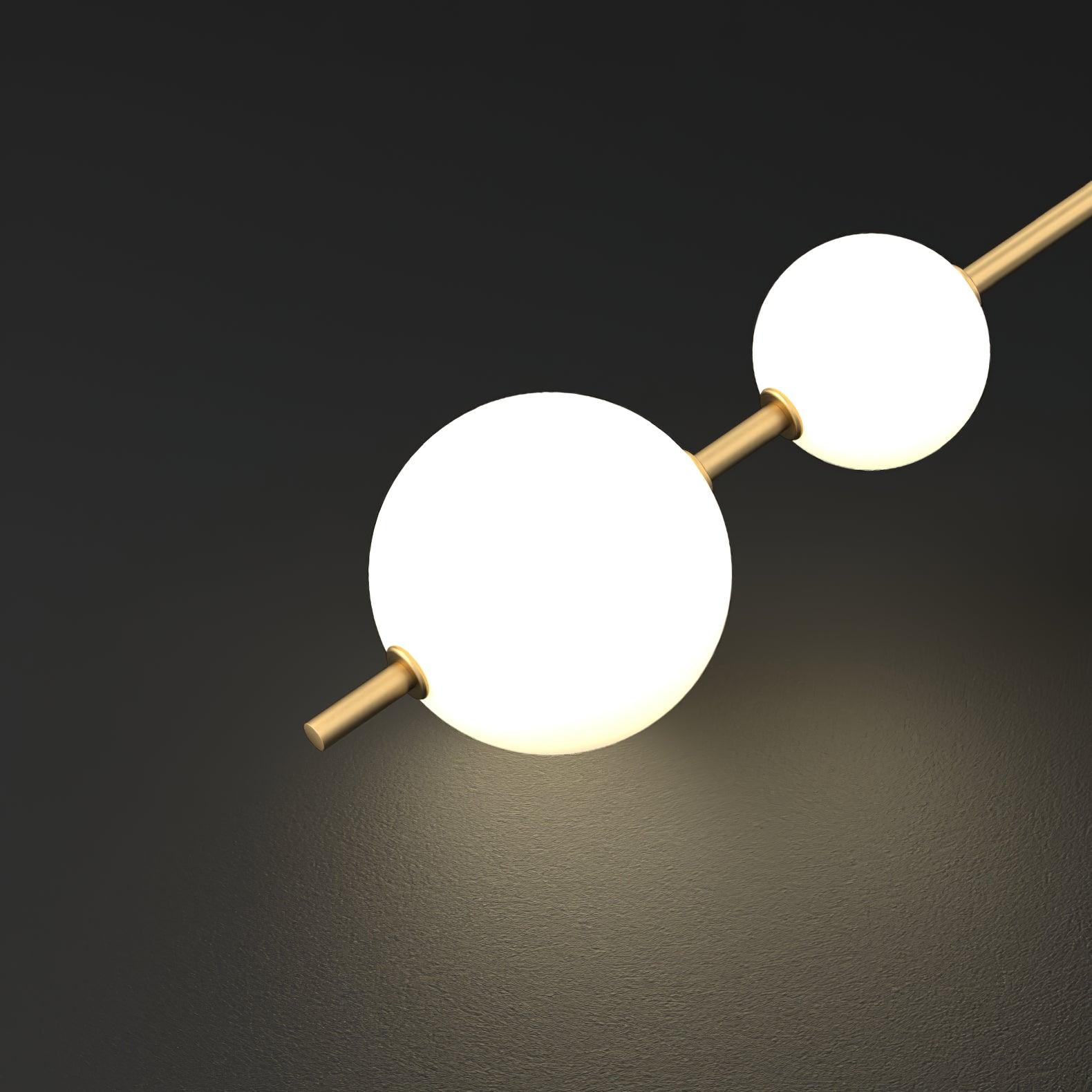 Modern Vertical Glass Globe Pendant Light in Black and Brass Finishes