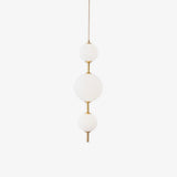 Modern Vertical Glass Globe Pendant Light in Black and Brass Finishes