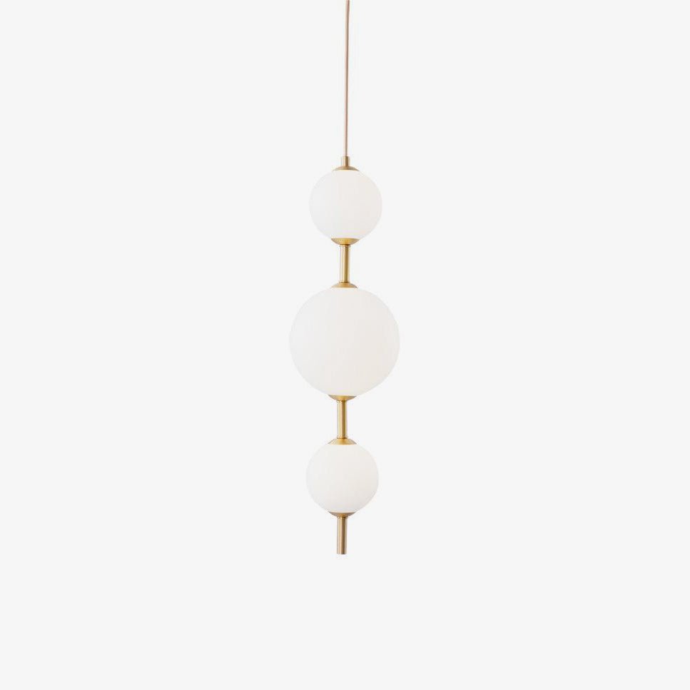 Modern Vertical Glass Globe Pendant Light in Black and Brass Finishes