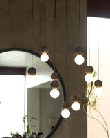 Modern Volcanic Stone and Glass Globe Pendant Light Plug In Swag Lamp