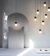 Modern Volcanic Stone and Glass Globe Pendant Light Plug In Swag Lamp