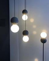 Modern Volcanic Stone and Glass Globe Pendant Light Plug In Swag Lamp