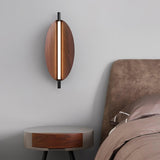 Modern Walnut Wood Grain LED Wall Sconce with Sleek Minimalist Board Design and Warm Lighting