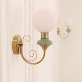 Onyx Modern Glass Globe Wall Sconce with Wood and Metal Accents for Indoor Lighting