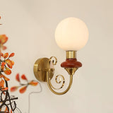 Onyx Modern Glass Globe Wall Sconce with Wood and Metal Accents for Indoor Lighting