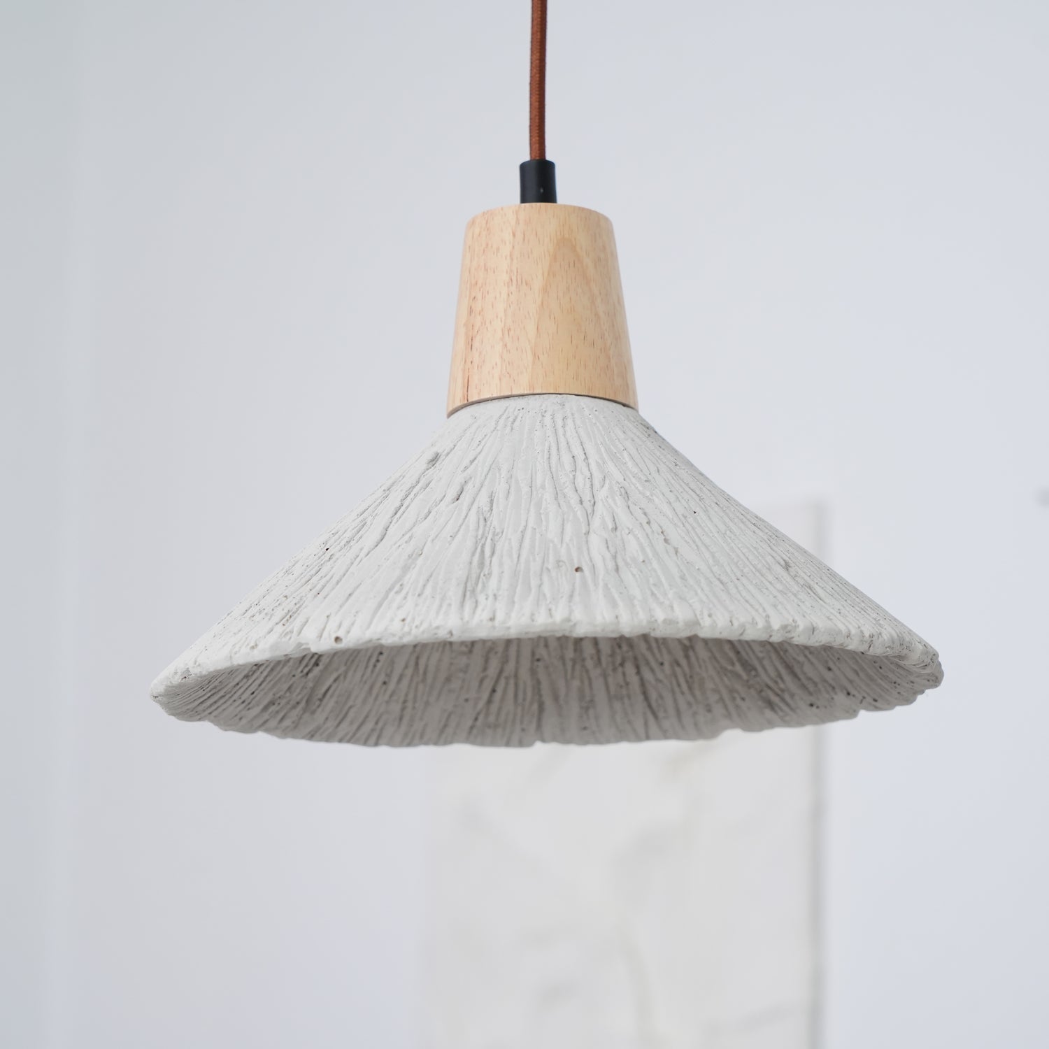 Pleated Concrete Pendant Light with Wood Accents for Modern Dining and Kitchen Decor