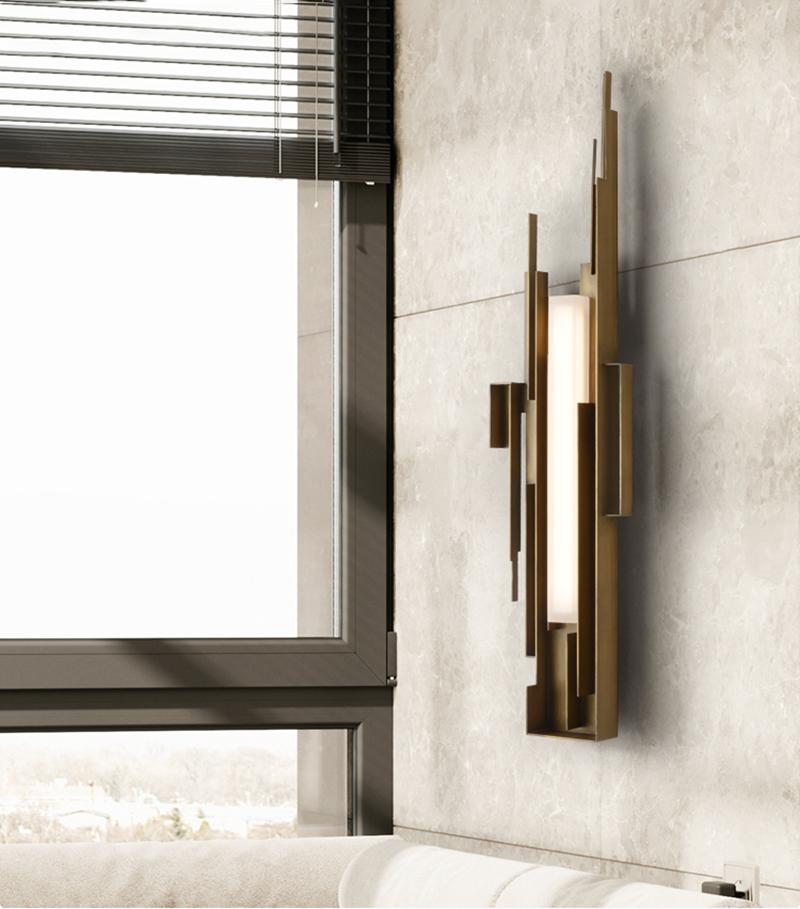modern-brutalist-gold-metal-sculpted-wall-sconce-integrated-led-vertical-light-fixture