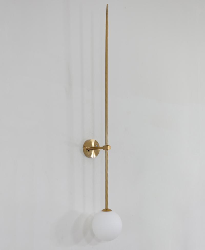 modern-brass-and-opal-glass-sphere-mobile-wall-sconce-lighting-for-indoor-spaces