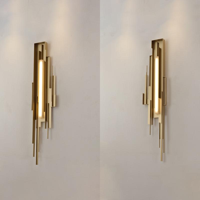 modern-brutalist-gold-metal-sculpted-wall-sconce-integrated-led-vertical-light-fixture