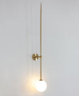 modern-brass-and-opal-glass-sphere-mobile-wall-sconce-lighting-for-indoor-spaces