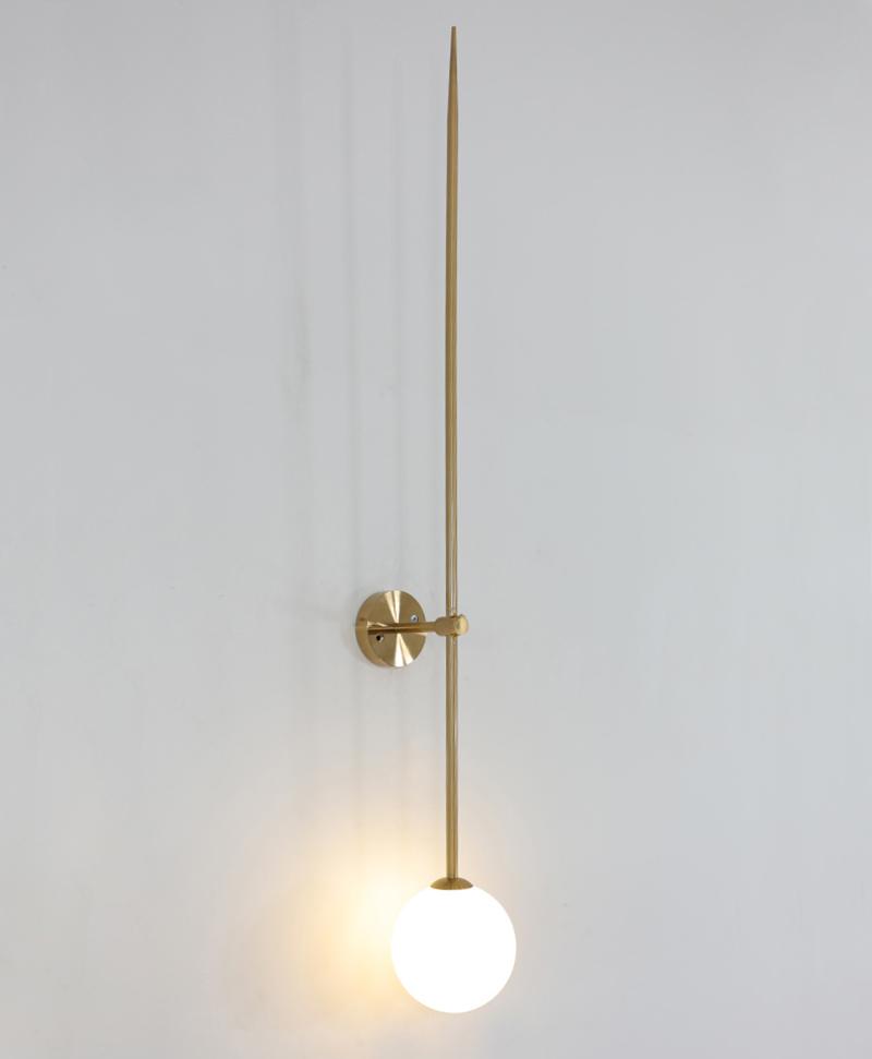 modern-brass-and-opal-glass-sphere-mobile-wall-sconce-lighting-for-indoor-spaces