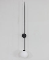 modern-brass-and-opal-glass-sphere-mobile-wall-sconce-lighting-for-indoor-spaces