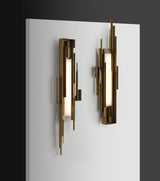 modern-brutalist-gold-metal-sculpted-wall-sconce-integrated-led-vertical-light-fixture