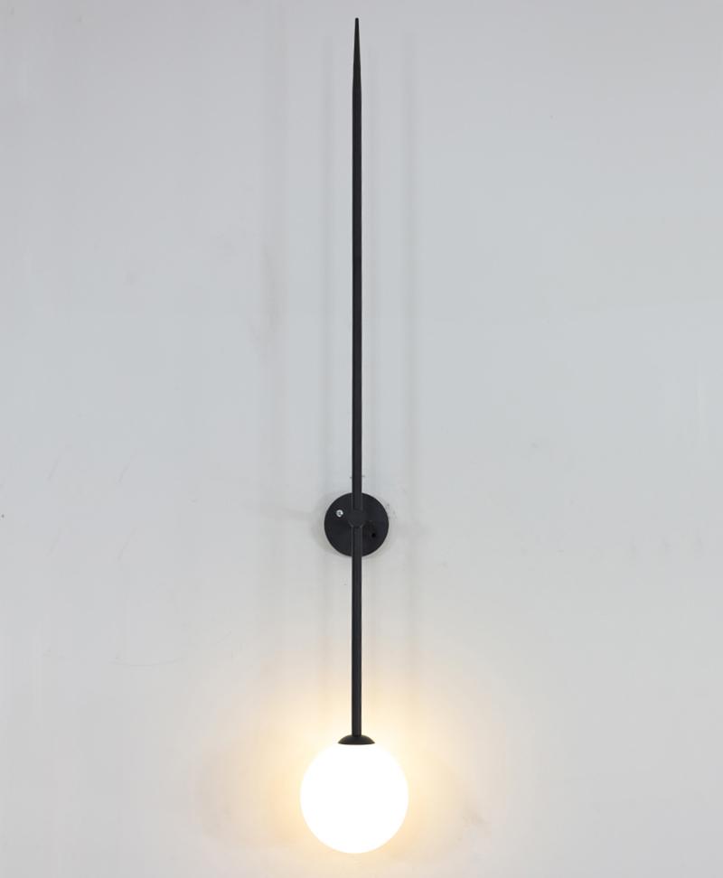 modern-brass-and-opal-glass-sphere-mobile-wall-sconce-lighting-for-indoor-spaces