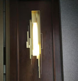 modern-brutalist-gold-metal-sculpted-wall-sconce-integrated-led-vertical-light-fixture