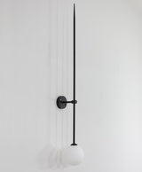 modern-brass-and-opal-glass-sphere-mobile-wall-sconce-lighting-for-indoor-spaces