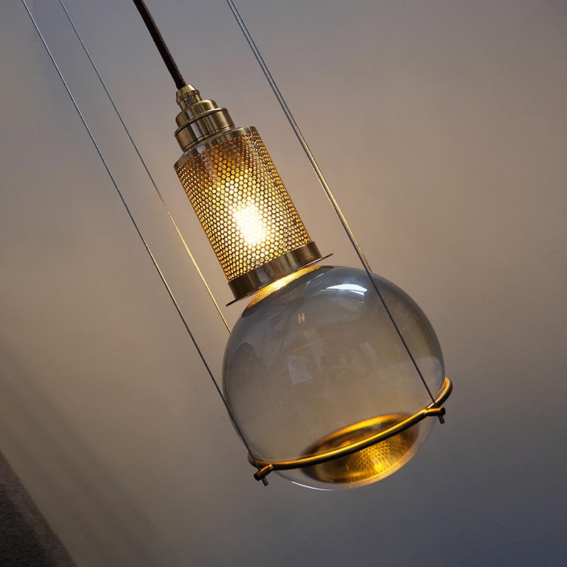 modern-glass-crystal-pendant-light-gold-chandelier-with-cylindrical-reflector-and-spherical-element-design